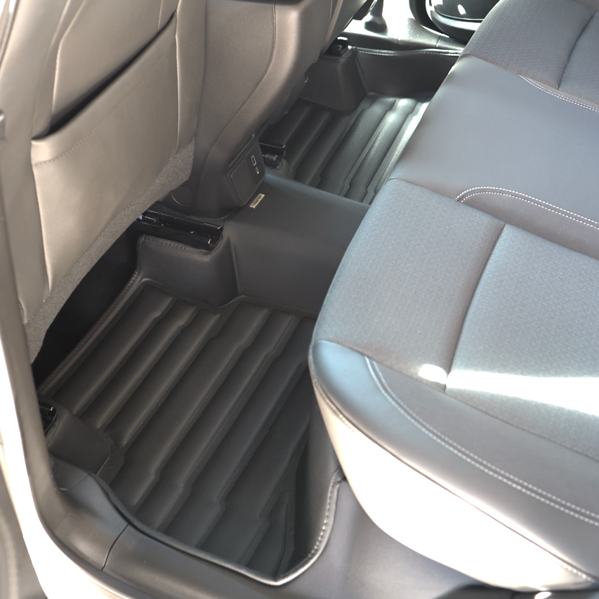 Mat Up! custom-fit all-weather floor mats installed in a vehicle footwell