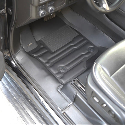 Mat Up! custom-fit all-weather floor mats installed in a vehicle footwell
