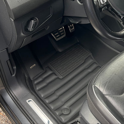 Mat Up! custom-fit all-weather floor mats installed in a vehicle footwell